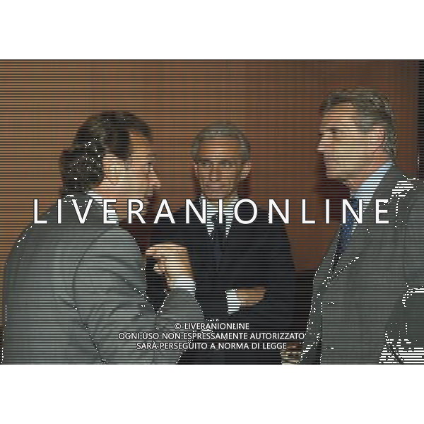 Hotel Gallia Milano 12/10/2004 Riunione dei Presidenti dei Club di serie A e B nella foto Giacinto Facchetti con massimo cellino e luca baraldi foto emilio andreoli/agenzia aldo liverani