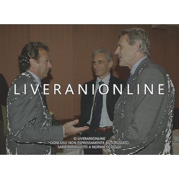 Hotel Gallia Milano 12/10/2004 Riunione dei Presidenti dei Club di serie A e B nella foto Giacinto Facchetti con massimo cellino e luca baraldi foto emilio andreoli/agenzia aldo liverani