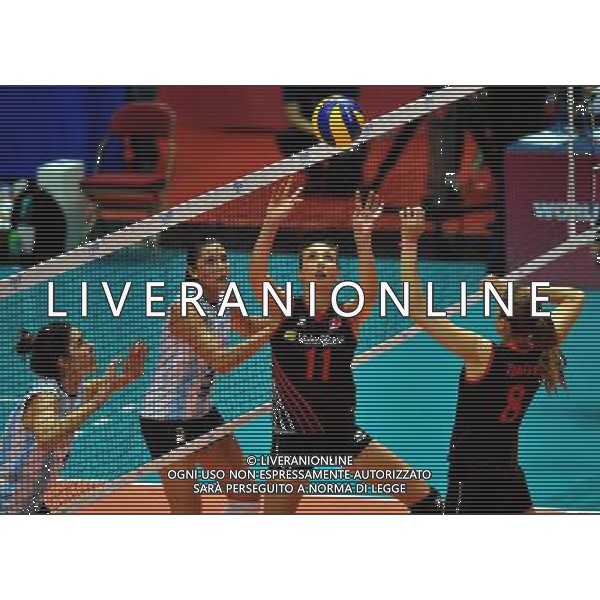 (130809) -- HONG KONG, Aug. 9, 2013 () -- Naz Aydemir (2nd R) of Turkey passes the ball during a match against Argentina at FIVB Volleyball World Grand Prix HK 2013 in south China\'s Hong Kong, Aug. 9, 2013. Turkey won 3-1. (/Lo Ping Fai)(xzj) ©photoshot/AGENZIA ALDO LIVERANI SAS - ITALY ONLY - Pallavolo FIVB World Grand Prix Volley 2013 a Hong Kong, Cina 9 agosto 2013