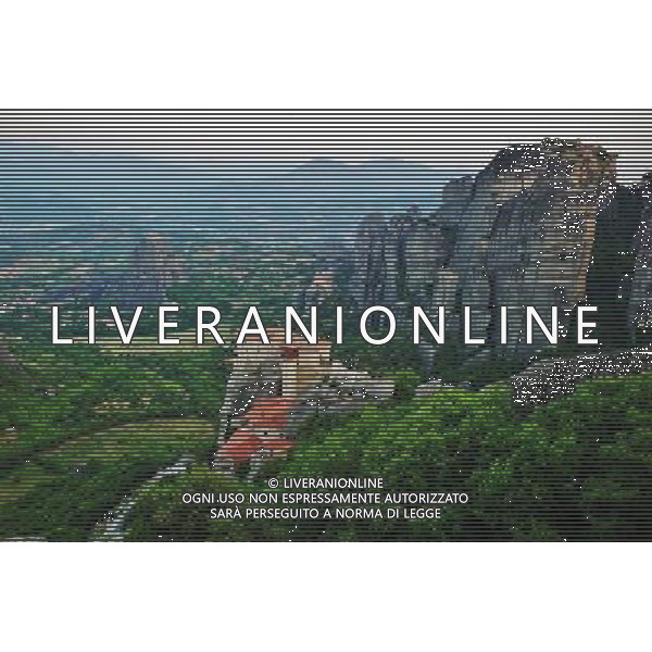 (130809) -- TRIKALA, Aug. 9, 2013 () -- Photo taken on June 20, 2013 shows the Meteora monasteries in Trikala Prefecture, Thessaly Region, Greece. Meteora, means \'Suspended in the air\' in Greek. In a region of almost inaccessible sandstone peaks, monks settled on these \'columns of the sky\' from the 11th century onwards. Twenty-four of these monasteries were built, despite incredible difficulties, at the time of the great revival of the eremetic ideal in the 15th century. Now there\'re 6 monasteries open to public, including two nunneries. The Meteora monasteries was inscribed onto UNESCO\'s World Heritage List in 1988. (/Liu Jiang) (lyx) ©photoshot/AGENZIA ALDO LIVERANI SAS - ITALY ONLY - I monasteri di Meteora nella Prefettura di Trikala, Tessaglia, Grecia patrimonio mondiale dell\'UNESCO dal 1988