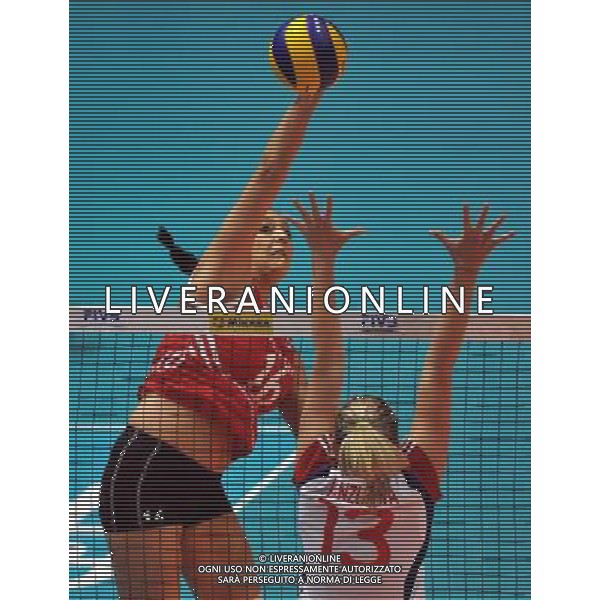 (130810) -- HONG KONG, Aug. 10, 2013 () -- Turkey\'s Busra Cansu (L) smashes the ball during a match against the Czech Republic at FIVB Volleyball World Grand Prix HK 2013 in Hong Kong, south China, Aug. 10, 2013. Turkey won the match 3-0. (/Lo Ping Fai) ©photoshot/AGENZIA ALDO LIVERANI SAS - ITALY ONLY - Pallavolo FIVB World Grand Prix Volley 2013 a Hong Kong, Cina agosto 2013
