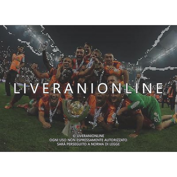 Turkish supercup match between Fenerbahce and Galatasaray at Kadir Has Stadium in Kayseri on August 11, 2013. Match Scored: Fenerbahce 0 - Galatasaray 1 Pictured: Didier Drogba and Players of Galatasaray celebrate winning the Turkey supercup. TURCJA SUPER PUCHAR LIGA TURECKA PILKA NOZNA SEZON 2013/2014 FOT.SESKIM PHOTO/NEWSPIX.PL TURKEY, GERMANY, AUSTRIA AND UK OUT !!! --- Newspix.pl AG ALDO LIVERANI SAS ONLY ITALY *** Local Caption *** www.newspix.pl mail us: info@newspix.pl call us: 0048 022 23 22 222 --- Polish Picture Agency by Ringier Axel Springer Poland