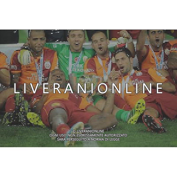 Turkish supercup match between Fenerbahce and Galatasaray at Kadir Has Stadium in Kayseri on August 11, 2013. Match Scored: Fenerbahce 0 - Galatasaray 1 Pictured: Didier Drogba and Players of Galatasaray celebrate winning the Turkey supercup. TURCJA SUPER PUCHAR LIGA TURECKA PILKA NOZNA SEZON 2013/2014 FOT.SESKIM PHOTO/NEWSPIX.PL TURKEY, GERMANY, AUSTRIA AND UK OUT !!! --- Newspix.pl AG ALDO LIVERANI SAS ONLY ITALY *** Local Caption *** www.newspix.pl mail us: info@newspix.pl call us: 0048 022 23 22 222 --- Polish Picture Agency by Ringier Axel Springer Poland