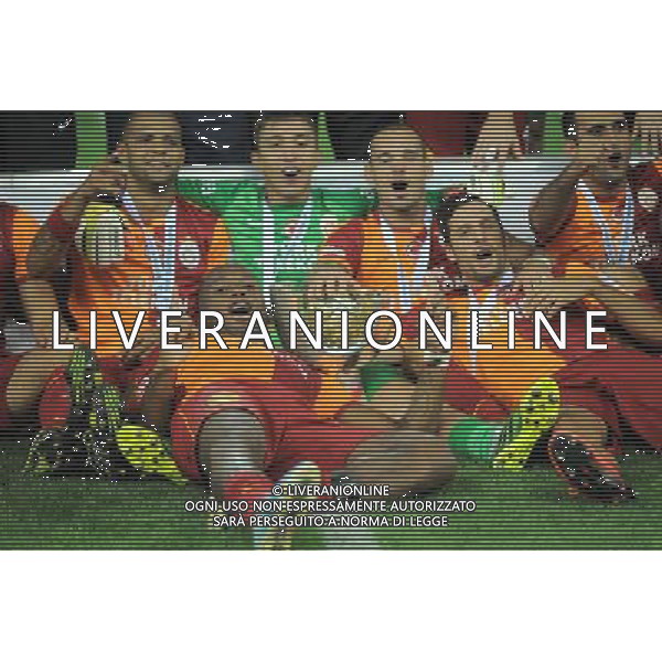 Turkish supercup match between Fenerbahce and Galatasaray at Kadir Has Stadium in Kayseri on August 11, 2013. Match Scored: Fenerbahce 0 - Galatasaray 1 Pictured: Didier Drogba and Players of Galatasaray celebrate winning the Turkey supercup. TURCJA SUPER PUCHAR LIGA TURECKA PILKA NOZNA SEZON 2013/2014 FOT.SESKIM PHOTO/NEWSPIX.PL TURKEY, GERMANY, AUSTRIA AND UK OUT !!! --- Newspix.pl AG ALDO LIVERANI SAS ONLY ITALY *** Local Caption *** www.newspix.pl mail us: info@newspix.pl call us: 0048 022 23 22 222 --- Polish Picture Agency by Ringier Axel Springer Poland