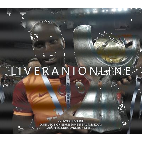 Turkish supercup match between Fenerbahce and Galatasaray at Kadir Has Stadium in Kayseri on August 11, 2013. Match Scored: Fenerbahce 0 - Galatasaray 1 Pictured: Didier Drogba of Galatasaray celebrate winning the Turkey supercup. TURCJA SUPER PUCHAR LIGA TURECKA PILKA NOZNA SEZON 2013/2014 FOT.SESKIM PHOTO/NEWSPIX.PL TURKEY, GERMANY, AUSTRIA AND UK OUT !!! --- Newspix.pl AG ALDO LIVERANI SAS ONLY ITALY *** Local Caption *** www.newspix.pl mail us: info@newspix.pl call us: 0048 022 23 22 222 --- Polish Picture Agency by Ringier Axel Springer Poland