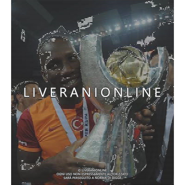 Turkish supercup match between Fenerbahce and Galatasaray at Kadir Has Stadium in Kayseri on August 11, 2013. Match Scored: Fenerbahce 0 - Galatasaray 1 Pictured: Didier Drogba of Galatasaray celebrate winning the Turkey supercup. TURCJA SUPER PUCHAR LIGA TURECKA PILKA NOZNA SEZON 2013/2014 FOT.SESKIM PHOTO/NEWSPIX.PL TURKEY, GERMANY, AUSTRIA AND UK OUT !!! --- Newspix.pl AG ALDO LIVERANI SAS ONLY ITALY *** Local Caption *** www.newspix.pl mail us: info@newspix.pl call us: 0048 022 23 22 222 --- Polish Picture Agency by Ringier Axel Springer Poland