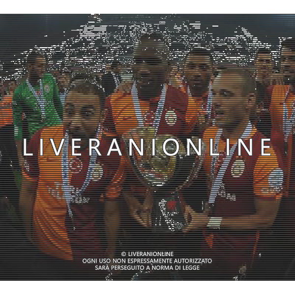 Turkish supercup match between Fenerbahce and Galatasaray at Kadir Has Stadium in Kayseri on August 11, 2013. Match Scored: Fenerbahce 0 - Galatasaray 1 Pictured: Didier Drogba and Wesley Sneijder of Galatasaray celebrate winning the Turkey supercup. TURCJA SUPER PUCHAR LIGA TURECKA PILKA NOZNA SEZON 2013/2014 FOT.SESKIM PHOTO/NEWSPIX.PL TURKEY, GERMANY, AUSTRIA AND UK OUT !!! --- Newspix.pl AG ALDO LIVERANI SAS ONLY ITALY *** Local Caption *** www.newspix.pl mail us: info@newspix.pl call us: 0048 022 23 22 222 --- Polish Picture Agency by Ringier Axel Springer Poland