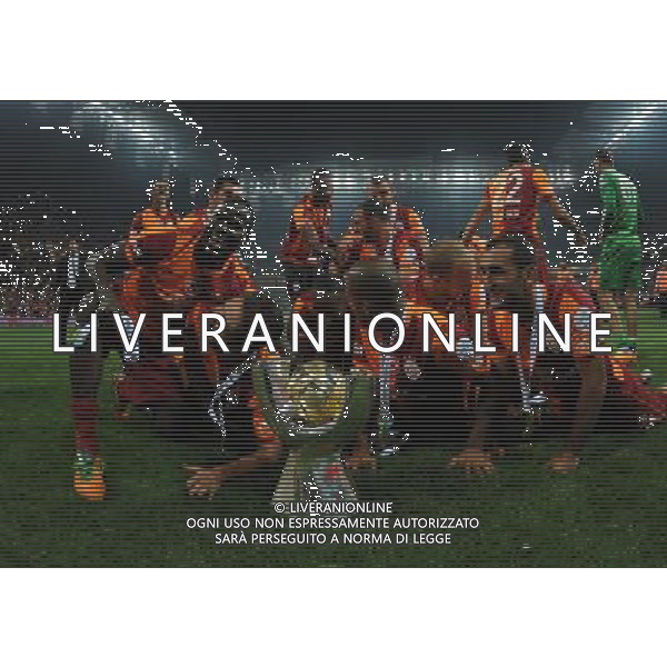 Turkish supercup match between Fenerbahce and Galatasaray at Kadir Has Stadium in Kayseri on August 11, 2013. Match Scored: Fenerbahce 0 - Galatasaray 1 Pictured: Didier Drogba and Players of Galatasaray celebrate winning the Turkey supercup. TURCJA SUPER PUCHAR LIGA TURECKA PILKA NOZNA SEZON 2013/2014 FOT.SESKIM PHOTO/NEWSPIX.PL TURKEY, GERMANY, AUSTRIA AND UK OUT !!! --- Newspix.pl AG ALDO LIVERANI SAS ONLY ITALY *** Local Caption *** www.newspix.pl mail us: info@newspix.pl call us: 0048 022 23 22 222 --- Polish Picture Agency by Ringier Axel Springer Poland