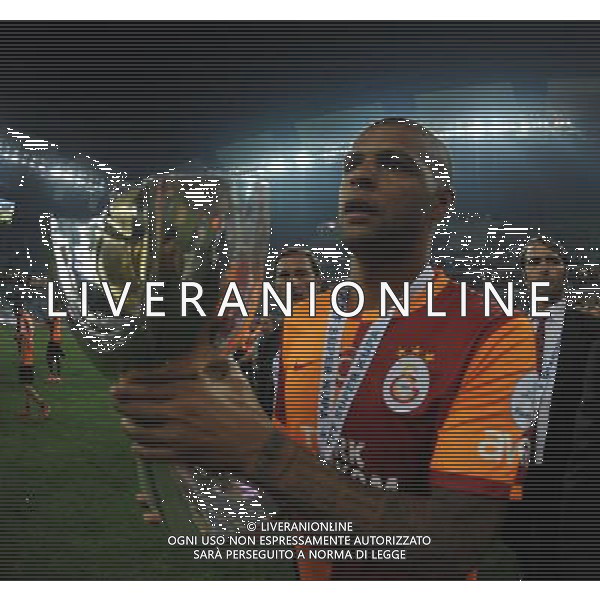 Turkish supercup match between Fenerbahce and Galatasaray at Kadir Has Stadium in Kayseri on August 11, 2013. Match Scored: Fenerbahce 0 - Galatasaray 1 Pictured: Felipe Melo of Galatasaray celebrate winning the Turkey supercup. TURCJA SUPER PUCHAR LIGA TURECKA PILKA NOZNA SEZON 2013/2014 FOT.SESKIM PHOTO/NEWSPIX.PL TURKEY, GERMANY, AUSTRIA AND UK OUT !!! --- Newspix.pl AG ALDO LIVERANI SAS ONLY ITALY *** Local Caption *** www.newspix.pl mail us: info@newspix.pl call us: 0048 022 23 22 222 --- Polish Picture Agency by Ringier Axel Springer Poland