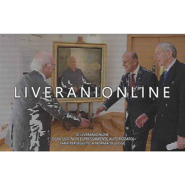 The Duke of Edinburgh meets Professor Peter Higgs (left) with Society President Sir John Arbuthnott before presenting Royal Medals at the Royal Society of Edinburgh as he carried out his first official engagement in nearly two months. The Royal Medals are awarded in a range of categories, these are Life Sciences, Physical and Engineering Sciences, Humanities and Social Sciences, Business and Commerce. ©photoshot/AGENZIA ALDO LIVERANI SAS - ITALY ONLY - REALI INGLESI: Filippo Duca di Edimburgo alla consegna delle Medaglie Reali nel suo primo impegno ufficiale in quasi due mesi.