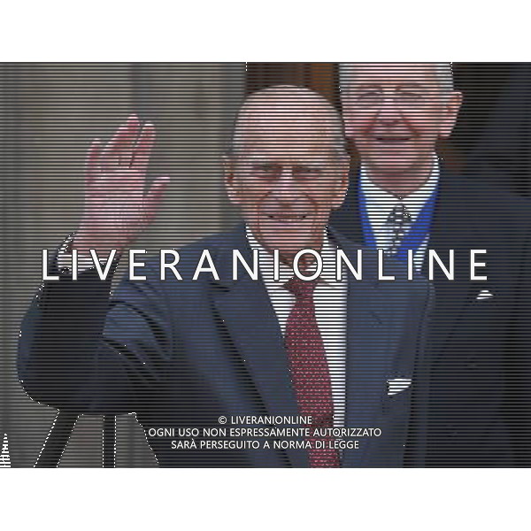 The Duke of Edinburgh waves as he leaves presenting Royal Medals at the Royal Society of Edinburgh as he carried out his first official engagement in nearly two months. The Royal Medals are awarded in a range of categories, these are Life Sciences, Physical and Engineering Sciences, Humanities and Social Sciences, Business and Commerce. ©photoshot/AGENZIA ALDO LIVERANI SAS - ITALY ONLY - REALI INGLESI: Filippo Duca di Edimburgo alla consegna delle Medaglie Reali nel suo primo impegno ufficiale in quasi due mesi.