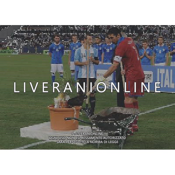 Amichevole FIFA Roma - 14.08.2013 Italia-Argentina Nella Foto:mascherano e buffon piantano un ulivo in onore di papa francesco /Ph.Vitez-Ag. Aldo Liverani