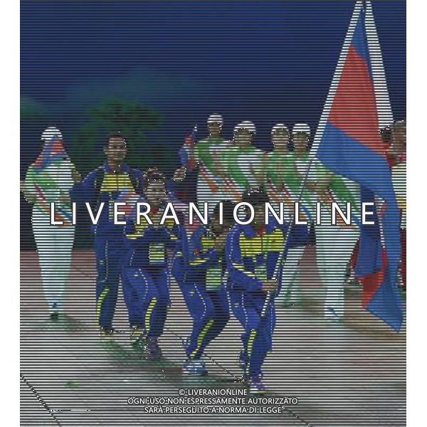 (130816) -- NANJING, Aug. 16, 2013 () -- The delegation of Cambodia enters the gym during the opening ceremony of the 2013 Asian Youth Games in Nanjing, capital of east China\'s Jiangsu Province, on Aug. 16, 2013. (/Wang Yuguo) ©photoshot/AGENZIA ALDO LIVERANI SAS - ITALY ONLY - Cerimonia di apertura dei Giochi della Gioventu\' 2013 asiatici a Nanjing capitale della Cina orientale nella provincia del Jiangsu, il 16 agosto 2013.