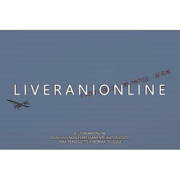 Roma - 18/08/2013 - Stadio Olimpico - Supercoppa TIM 2013-2014 - Juventus vs SS Lazio - nella foto: Un aereo sorvola lo stadio Olimpico con la scritta V\'arzamo in faccia il nome immortaleâ€¦ AS Roma /Ph. Fabrizio Corradetti - Ag. Aldo Liverani sas
