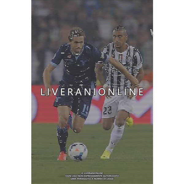 Roma - 18/08/2013 - Stadio Olimpico - Supercoppa TIM 2013-2014 - Juventus vs SS Lazio - nella foto: Lulic e vidal /Ph. Fabrizio Corradetti - Ag. Aldo Liverani sas