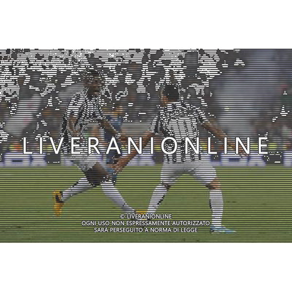 Roma - 18/08/2013 - Stadio Olimpico - Supercoppa TIM 2013-2014 - Juventus vs SS Lazio - nella foto: tevez esulta con pogda dopo il gol /Ph. Fabrizio Corradetti - Ag. Aldo Liverani sas