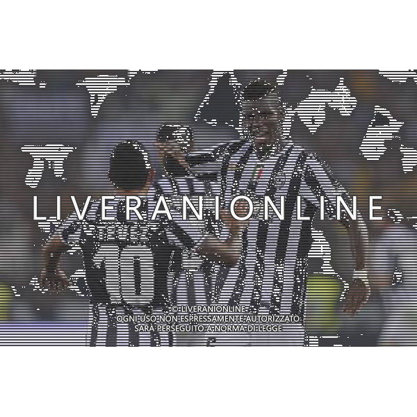 Roma - 18/08/2013 - Stadio Olimpico - Supercoppa TIM 2013-2014 - Juventus vs SS Lazio - nella foto: pogda e tevez esultano /Ph. Fabrizio Corradetti - Ag. Aldo Liverani sas