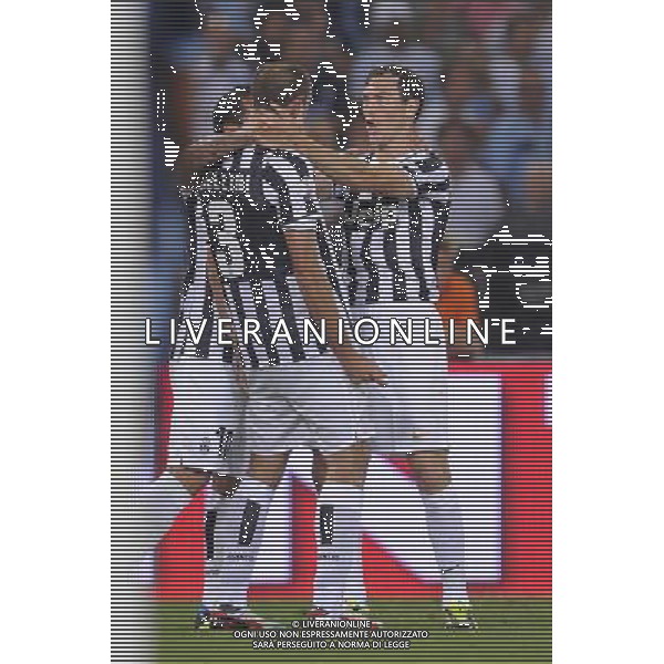 Roma - 18/08/2013 - Stadio Olimpico - Supercoppa TIM 2013-2014 - Juventus vs SS Lazio - nella foto: Stephan Lichtsteiner esulta con Giorgio Chiellini dopo il gol del 2 a 0 /Ph. Fabrizio Corradetti - Ag. Aldo Liverani sas