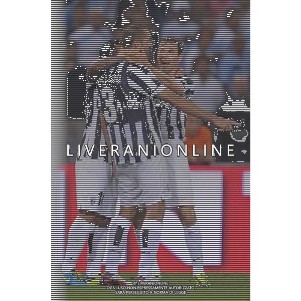 Roma - 18/08/2013 - Stadio Olimpico - Supercoppa TIM 2013-2014 - Juventus vs SS Lazio - nella foto: Stephan Lichtsteiner esulta con Giorgio Chiellini dopo il gol del 2 a 0 /Ph. Fabrizio Corradetti - Ag. Aldo Liverani sas