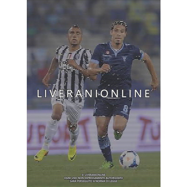Roma - 18/08/2013 - Stadio Olimpico - Supercoppa TIM 2013-2014 - Juventus vs SS Lazio - nella foto: Anderson Hernanes ed Arturo Vidal /Ph. Fabrizio Corradetti - Ag. Aldo Liverani sas