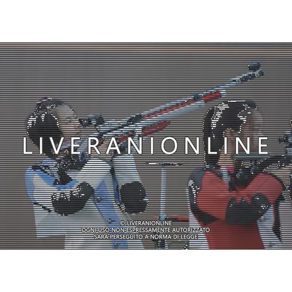 (130818) -- NANJING , Aug. 18, 2013 () -- China\'s He Zichao (L) competes during the women\'s 10m air rifle final of shooting event at 2013 Asian Youth Games in Nanjing, capital of east China\'s Jiangsu Province, on Aug. 18, 2013. He Zichao won the gold with 205.3 rings.(/Zhao Peng) ©PHOTOSHOT/AGENZIA ALDO LIVERANI SAS - ITALY ONLY - Giochi della Gioventu\' 2013 asiatici a Nanjing capitale della Cina orientale nella provincia del Jiangsu, agosto 2013.
