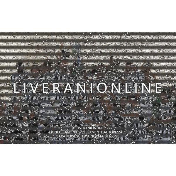 Supercoppa TIM 2013 Torino - 18.08.2013 Juventus-Lazio Nella Foto:Squadra Buffon Gianluigi alzano la coppa /Ph.Vitez-Ag. Aldo Liverani