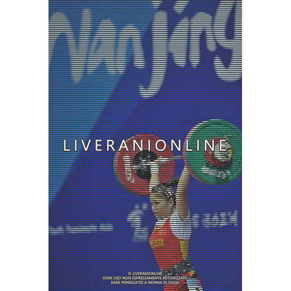 (130819) -- NANJING , Aug. 19, 2013 () -- China\'s Lin Binglian competes during the women\'s 53kg weightlifting competition at 2013 Asian Youth Games in Nanjing, capital of east China\'s Jiangsu Province, on Aug. 19, 2013. Lin Binglian won the gold medal with a weight of 188kg. (/Shen Peng) ©photoshot/AGENZIA ALDO LIVERANI SAS - ITALY ONLY - Giochi della Gioventu\' 2013 asiatici a Nanjing capitale della Cina orientale nella provincia del Jiangsu, agosto 2013.