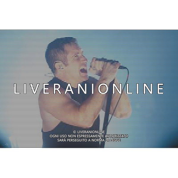 American Industrial rock band Nine Inch Nails (NIN for short) perform an intimate warm up gig at Scala, King\'s Cross, London, England, UK on 20th August 2013 prior to Reading and Leeds festival. The band consists of Trent Reznor (vocals), Robin Finck (guitarist left of Trent, one time GnR guitarist), Joshua Eustis (guitarist right of Trent), Alessandro Cortini (keyboards) and Ilan Rubin (drums). Pictured: Trent Reznor ©photoshot/AGENZIA ALDO LIVERANI SAS - ITALY ONLY - EDITORIAL USE ONLY