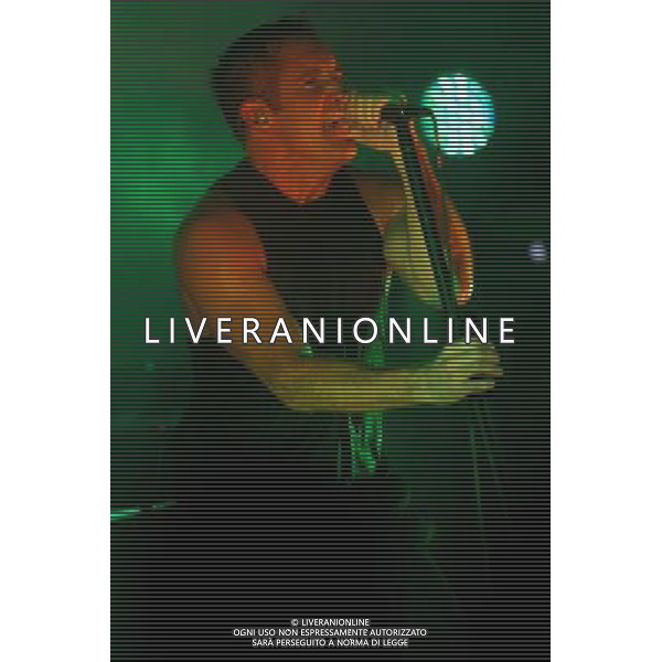 American Industrial rock band Nine Inch Nails (NIN for short) perform an intimate warm up gig at Scala, King\'s Cross, London, England, UK on 20th August 2013 prior to Reading and Leeds festival. The band consists of Trent Reznor (vocals), Robin Finck (guitarist left of Trent, one time GnR guitarist), Joshua Eustis (guitarist right of Trent), Alessandro Cortini (keyboards) and Ilan Rubin (drums). Pictured: Trent Reznor ©photoshot/AGENZIA ALDO LIVERANI SAS - ITALY ONLY - EDITORIAL USE ONLY