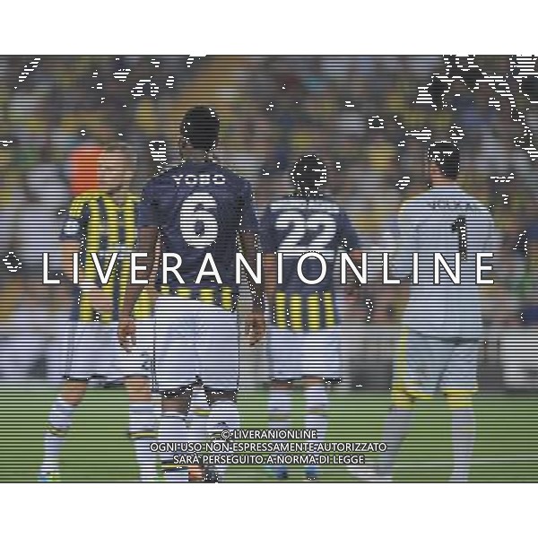 UEFA Chanpions League playoff first leg match between Fenerbahce and Arsenal at Sukru Saracoglu Stadiym in Istanbul, Turkey on august 21, 2013. Pictured: Joseph Yobo, Goalkeeper Volkan Demirel and Mehmet Topal of Fenerbahce. LIGA MISTRZOW SEZON 2013/2014 PILKA NOZNA FENERBAHCE ISTAMBUL vs ARSENAL LONDYN FOT.SESKIMPHOTO/NEWSPIX.PL POLAND, TURKEY, GERMANY, AUSTRIA AND UK OUT !!! --- Newspix.pl AG ALDO LIVERANI SAS ONLY ITALY *** Local Caption *** www.newspix.pl mail us: info@newspix.pl call us: 0048 022 23 22 222 --- Polish Picture Agency by Ringier Axel Springer Poland