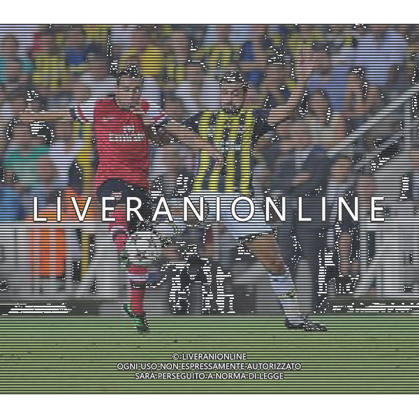 UEFA Chanpions League playoff first leg match between Fenerbahce and Arsenal at Sukru Saracoglu Stadiym in Istanbul, Turkey on august 21, 2013. Pictured: Santiago Cazorla Gonzalez (L) of Arsenal and Bekir Irtegun of Fenerbahce. LIGA MISTRZOW SEZON 2013/2014 PILKA NOZNA FENERBAHCE ISTAMBUL vs ARSENAL LONDYN FOT.SESKIMPHOTO/NEWSPIX.PL POLAND, TURKEY, GERMANY, AUSTRIA AND UK OUT !!! --- Newspix.pl AG ALDO LIVERANI SAS ONLY ITALY *** Local Caption *** www.newspix.pl mail us: info@newspix.pl call us: 0048 022 23 22 222 --- Polish Picture Agency by Ringier Axel Springer Poland