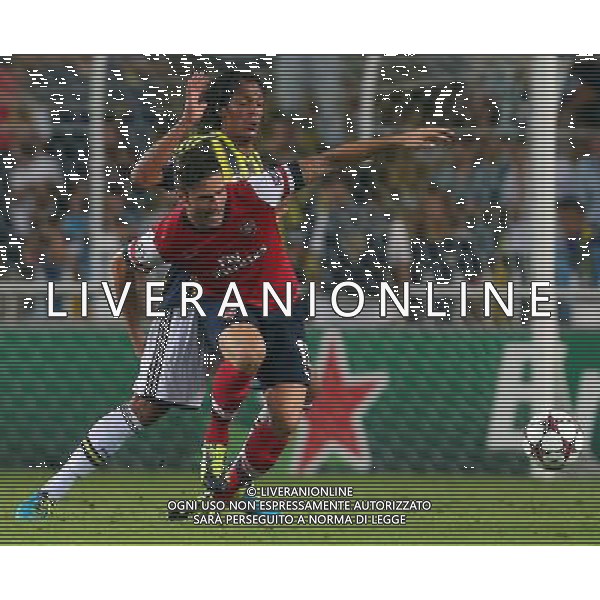 UEFA Chanpions League playoff first leg match between Fenerbahce and Arsenal at Sukru Saracoglu Stadiym in Istanbul, Turkey on august 21, 2013. Pictured: Olivier Giroud of Arsenal and Bruno Alves of Fenerbahce. LIGA MISTRZOW SEZON 2013/2014 PILKA NOZNA FENERBAHCE ISTAMBUL vs ARSENAL LONDYN FOT.SESKIMPHOTO/NEWSPIX.PL POLAND, TURKEY, GERMANY, AUSTRIA AND UK OUT !!! --- Newspix.pl AG ALDO LIVERANI SAS ONLY ITALY *** Local Caption *** www.newspix.pl mail us: info@newspix.pl call us: 0048 022 23 22 222 --- Polish Picture Agency by Ringier Axel Springer Poland