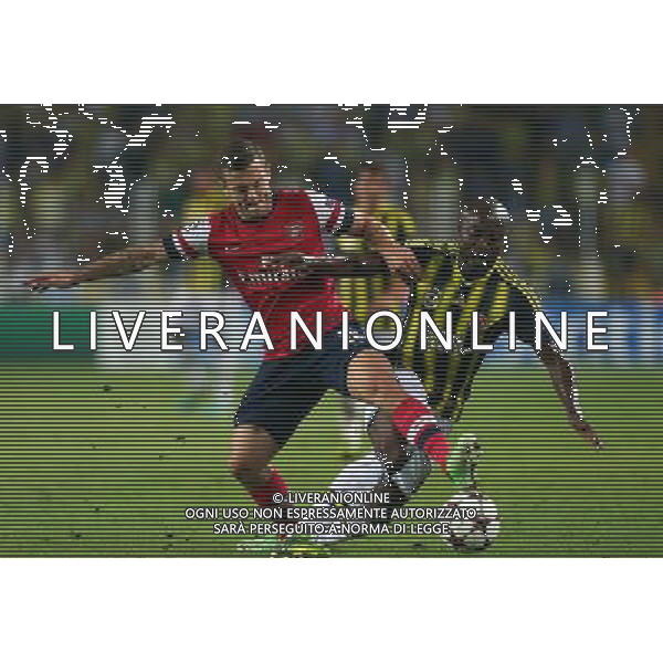 UEFA Chanpions League playoff first leg match between Fenerbahce and Arsenal at Sukru Saracoglu Stadiym in Istanbul, Turkey on august 21, 2013. Pictured: Jack Wilshere of Arsenal and Pierre Webo of Fenerbahce. LIGA MISTRZOW SEZON 2013/2014 PILKA NOZNA FENERBAHCE ISTAMBUL vs ARSENAL LONDYN FOT.SESKIMPHOTO/NEWSPIX.PL POLAND, TURKEY, GERMANY, AUSTRIA AND UK OUT !!! --- Newspix.pl AG ALDO LIVERANI SAS ONLY ITALY *** Local Caption *** www.newspix.pl mail us: info@newspix.pl call us: 0048 022 23 22 222 --- Polish Picture Agency by Ringier Axel Springer Poland