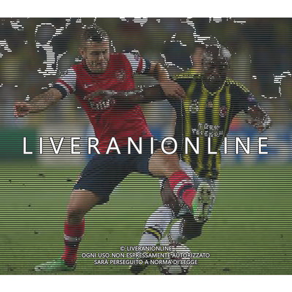 UEFA Chanpions League playoff first leg match between Fenerbahce and Arsenal at Sukru Saracoglu Stadiym in Istanbul, Turkey on august 21, 2013. Pictured: Jack Wilshere of Arsenal and Pierre Webo of Fenerbahce. LIGA MISTRZOW SEZON 2013/2014 PILKA NOZNA FENERBAHCE ISTAMBUL vs ARSENAL LONDYN FOT.SESKIMPHOTO/NEWSPIX.PL POLAND, TURKEY, GERMANY, AUSTRIA AND UK OUT !!! --- Newspix.pl AG ALDO LIVERANI SAS ONLY ITALY *** Local Caption *** www.newspix.pl mail us: info@newspix.pl call us: 0048 022 23 22 222 --- Polish Picture Agency by Ringier Axel Springer Poland