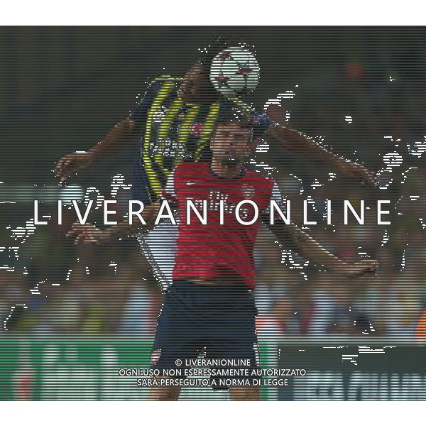 UEFA Chanpions League playoff first leg match between Fenerbahce and Arsenal at Sukru Saracoglu Stadiym in Istanbul, Turkey on august 21, 2013. Pictured: Olivier Giroud of Arsenal and Bruno Alves of Fenerbahce. LIGA MISTRZOW SEZON 2013/2014 PILKA NOZNA FENERBAHCE ISTAMBUL vs ARSENAL LONDYN FOT.SESKIMPHOTO/NEWSPIX.PL POLAND, TURKEY, GERMANY, AUSTRIA AND UK OUT !!! --- Newspix.pl AG ALDO LIVERANI SAS ONLY ITALY *** Local Caption *** www.newspix.pl mail us: info@newspix.pl call us: 0048 022 23 22 222 --- Polish Picture Agency by Ringier Axel Springer Poland