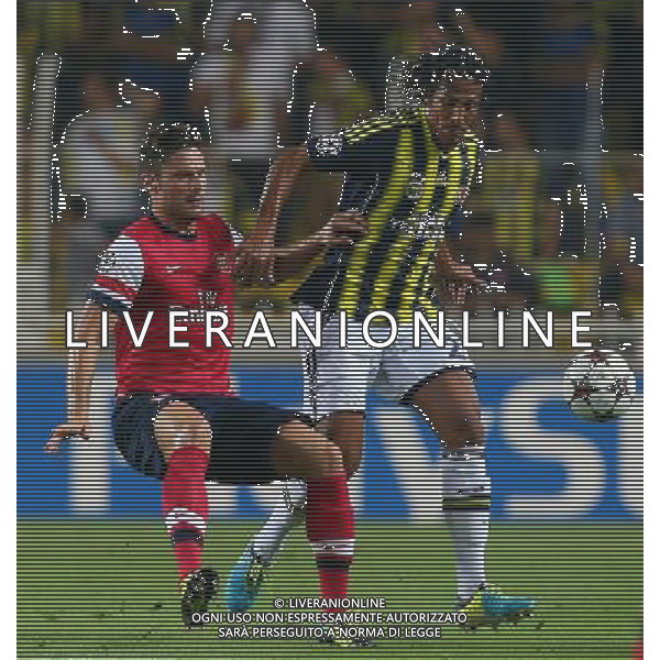 UEFA Chanpions League playoff first leg match between Fenerbahce and Arsenal at Sukru Saracoglu Stadiym in Istanbul, Turkey on august 21, 2013. Pictured: Olivier Giroud of Arsenal and Bruno Alves of Fenerbahce. LIGA MISTRZOW SEZON 2013/2014 PILKA NOZNA FENERBAHCE ISTAMBUL vs ARSENAL LONDYN FOT.SESKIMPHOTO/NEWSPIX.PL POLAND, TURKEY, GERMANY, AUSTRIA AND UK OUT !!! --- Newspix.pl AG ALDO LIVERANI SAS ONLY ITALY *** Local Caption *** www.newspix.pl mail us: info@newspix.pl call us: 0048 022 23 22 222 --- Polish Picture Agency by Ringier Axel Springer Poland