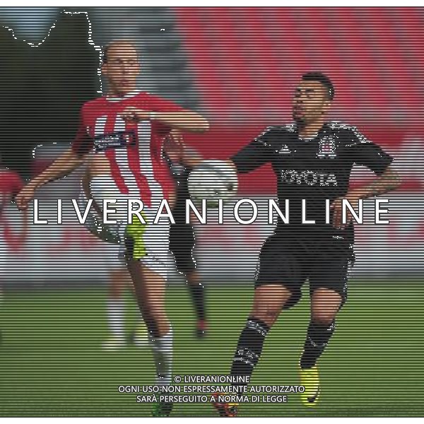 UEFA Europa league playoff first leg match between Tromso and Besiktas at Alfheim Stadium in Tromso, Norway. 22.08.2012 Pictured: Bruno Ferreira Bonfim (Dentinho) (R) of Besiktas and Ruben Kristiansen (L) of Tromso. LIGA EUROPY UEFA KWALIFIKACJE SEZON 2013/2014 PILKA NOZNA TROMSO NORWEGIA vs BESIKTAS ISTAMBUL FOT.SESKIMPHOTO/NEWSPIX.PL POLAND, TURKEY, GERMANY, AUSTRIA AND UK OUT !!! --- Newspix.pl AG ALDO LIVERANI SAS *** Local Caption *** www.newspix.pl mail us: info@newspix.pl call us: 0048 022 23 22 222 --- Polish Picture Agency by Ringier Axel Springer Poland