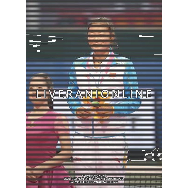 (130823)--NANJING, Aug. 23 -- Silver medalists China\'s Wang Yan attends the awarding ceremony of Women\'s Singles Final of Tennis event at 2013 Asian Youth Games in Nanjing, capital city of east China\'s Jiangsu Province, on Aug. 23, 2013. China\'s Sun Ziyue won the gold medal, Thailand\'s Buayam Kamonwan and Kazakhstan\'s Dair Assiya got the bronze medal together. (/Zhou Mi) ©photoshot/AGENZIA ALDO LIVERANI SAS - ITALY ONLY - Giochi della Gioventu\' 2013 asiatici a Nanjing capitale della Cina orientale nella provincia del Jiangsu, agosto 2013.