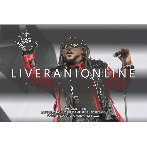 Welsh reggae metal band Skindred perform at Reading Festival 2013, Richfield Avenue, Reading, England, UK on 23rd August 2013. The band consists of Benji Webbe (lead vocals), Daniel Pugsley (bass), Michael Fry (guitar, backing vocals) and Arya Goggin (drums). ©PHOTOSHOT/AGENZIA ALDO LIVERANI SAS - ITALY ONLY - EDITORIAL USE ONLY