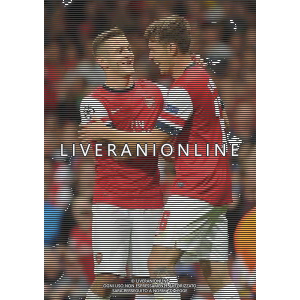  Aaron Ramsey and Jack Wilshire celebrate Ramsey\'s second goal while playing in the Champions League qualifier second leg, between Arsenal and Fenerbahce at The Emirates Stadium, London, on Tuesday August 27, 2013. ©photoshot/AGENZIA ALDO LIVERANI SAS - ITALY ONLY - Arsenal vs Fenerbahce gara ritorno Preliminari Champions League all\'Emirates Stadium di Londra, 27 Agosto, 2013.