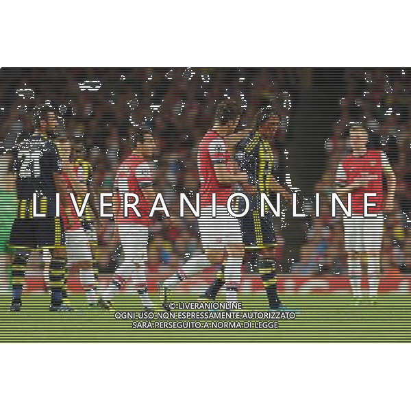  Olivier Giroud and Bruno Alves playing in the Champions League qualifier second leg, between Arsenal and Fenerbahce at The Emirates Stadium, London, on Tuesday August 27, 2013. ©photoshot/AGENZIA ALDO LIVERANI SAS - ITALY ONLY - Arsenal vs Fenerbahce gara ritorno Preliminari Champions League all\'Emirates Stadium di Londra, 27 Agosto, 2013.