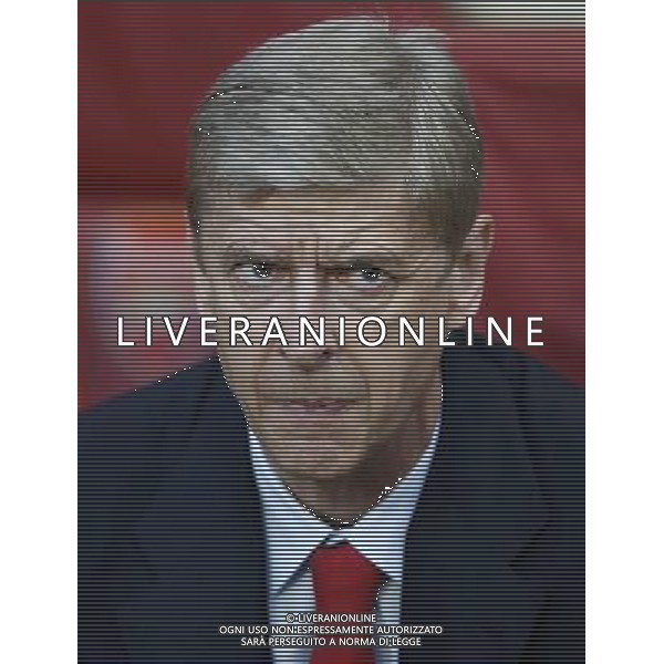 (130828) -- LONDON, Aug. 28, 2013 () -- Arsene Wenger, manager of Arsenal looks on ahead of the UEFA Champions League Play-off Round Second leg match between Arsenal FC and Fenerbahce SK at Emirates Stadium in London, Britain on Aug. 27, 2013. Arsenal won 2-0 in this match. Arsenal defeated Fenerbahce with a 5-0 in aggregate to reach the Champions League for the 16th consecutive year.(/Wang Lili)