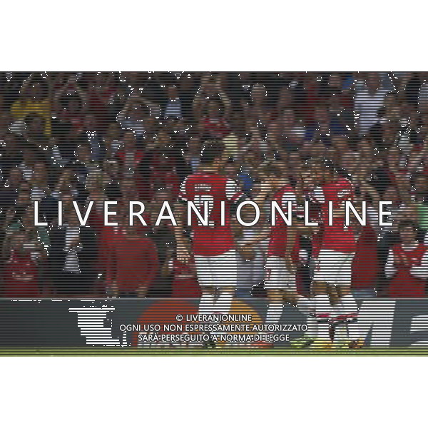 (130828) -- LONDON, Aug. 28, 2013 () -- Aaron Ramsey (2nd R) celebrates scoring his first Arsenal goal during the UEFA Champions League Play-off Round Second leg match between Arsenal FC and Fenerbahce SK at Emirates Stadium in London, Britain on Aug. 27, 2013. Arsenal won 2-0 in this match. Arsenal defeated Fenerbahce with a 5-0 in aggregate to reach the Champions League for the 16th consecutive year.(/Wang Lili)