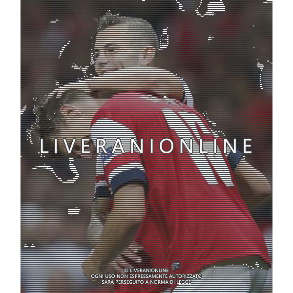 (130828) -- LONDON, Aug 28, 2013 () -- Aaron Ramsey (L) celebrates scoring his second Arsenal goal with Jack Wilshere during the UEFA Champions League Play-off Round Second leg match between Arsenal FC and Fenerbahce SK at Emirates Stadium in London, Britain on Aug. 27, 2013. Arsenal won 2-0 in this match. Arsenal defeated Fenerbahce with a 5-0 in aggregate to reach the Champions League for the 16th consecutive year.(/Wang Lili)