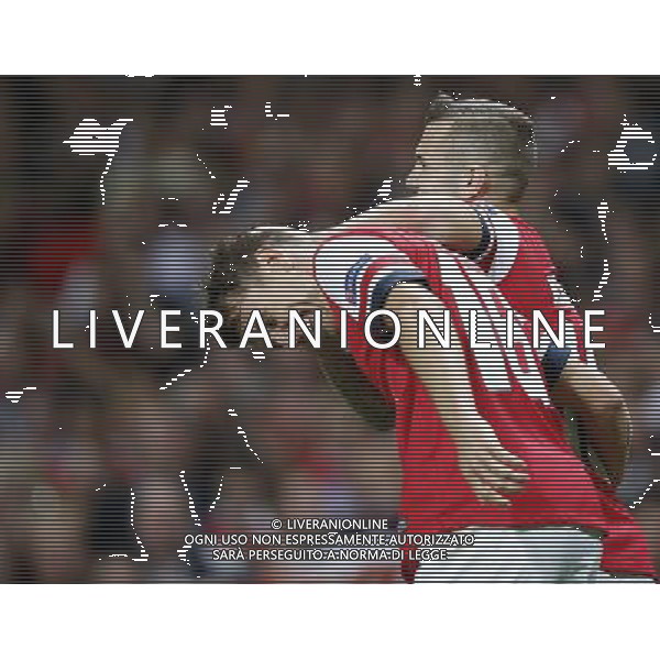 (130828) -- LONDON, Aug. 28, 2013 () -- Aaron Ramsey(L) celebrates scoring his second Arsenal goal with Jack Wilshere during the UEFA Champions League Play-off Round Second leg match between Arsenal FC and Fenerbahce SK at Emirates Stadium in London, Britain on Aug. 27, 2013. Arsenal won 2-0 in this match. Arsenal defeated Fenerbahce with a 5-0 in aggregate to reach the Champions League for the 16th consecutive year.(/Wang Lili)