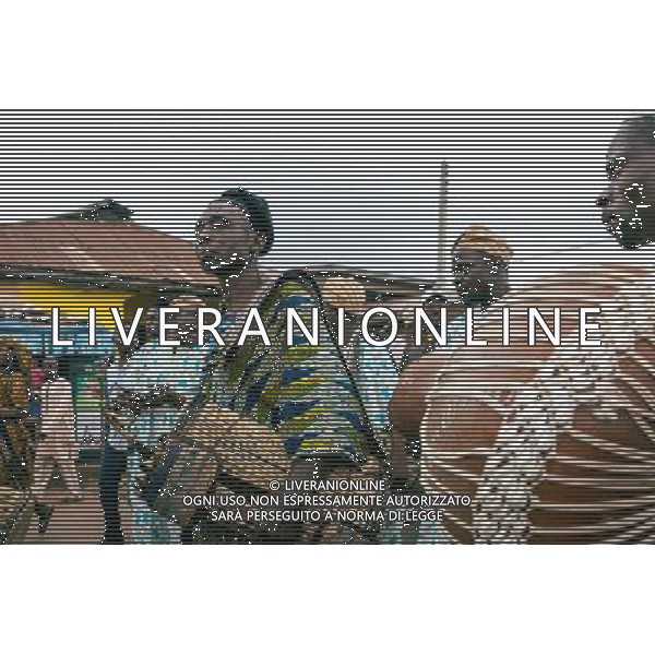 (130826) -- LAGOS, Aug. 26, 2013 () -- A performer plays drum during the Osun Osogbo festival, or the river goddess festival, in Osogbo, capital of southwest Nigeria\'s Osun State, on Aug. 23, 2013. Every August in Osogbo, the festival presents an opportunity for the indigenes of Osogbo, their friends and well-wishers as well as fun-loving tourists to converge in town for the yearly celebration. The festival has gained a global recognition to such an extent that the Osun Grove was enlisted as a world heritage site in 2005. (/Zhang Weiyi) ©photoshot/AGENZIA ALDO LIVERANI SAS - ITALY ONLY - La popolazione indigena durante i festeggiamenti della Osun Osogbo festa della dea del fiume, in Osogbo, capitale dello Stato di Osun sud-ovest della Nigeria, il 23 agosto 2013.