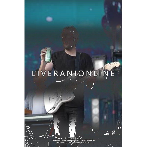 Foals perform on the Main Stage at Leeds Festival, Bramham Park, Leeds, UK on 25th August 2013. Shown here Jimmy Smith (guitar) ©photoshot/AGENZIA ALDO LIVERANI SAS - ITALY ONLY - EDITORIAL USE ONLY