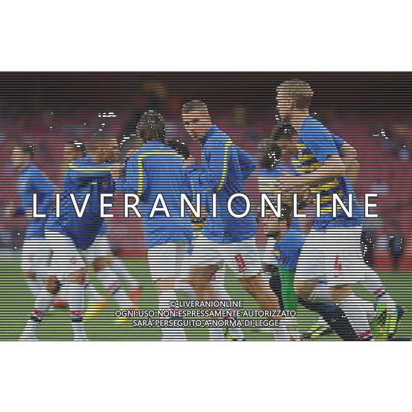  Lukas Podolski warming up before the Champions League qualifier second leg, between Arsenal and Fenerbahce at The Emirates Stadium, London, on Tuesday August 27, 2013. ©photoshot/AGENZIA ALDO LIVERANI SAS - ITALY ONLY - EDITORIAL USE ONLY