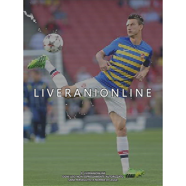  Laurent Koscielney warming up before the Champions League qualifier second leg, between Arsenal and Fenerbahce at The Emirates Stadium, London, on Tuesday August 27, 2013. ©photoshot/AGENZIA ALDO LIVERANI SAS - ITALY ONLY - EDITORIAL USE ONLY