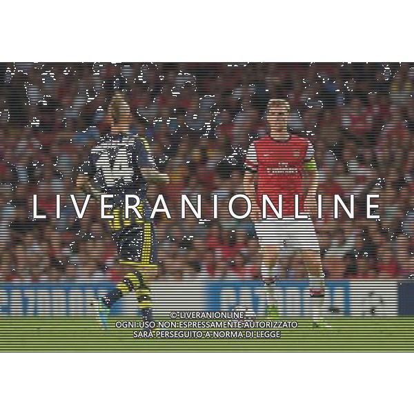  Per Mertesacker playing in the Champions League qualifier second leg, between Arsenal and Fenerbahce at The Emirates Stadium, London, on Tuesday August 27, 2013. ©photoshot/AGENZIA ALDO LIVERANI SAS - ITALY ONLY - EDITORIAL USE ONLY